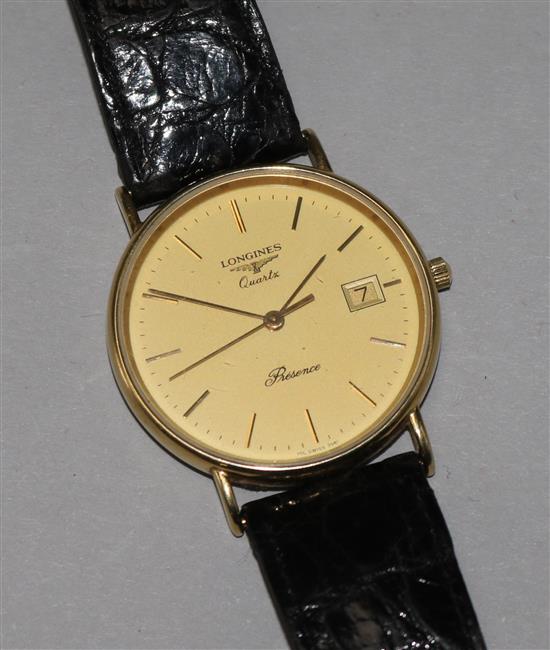 A gentlemans Longines 9ct gold quartz wrist watch.